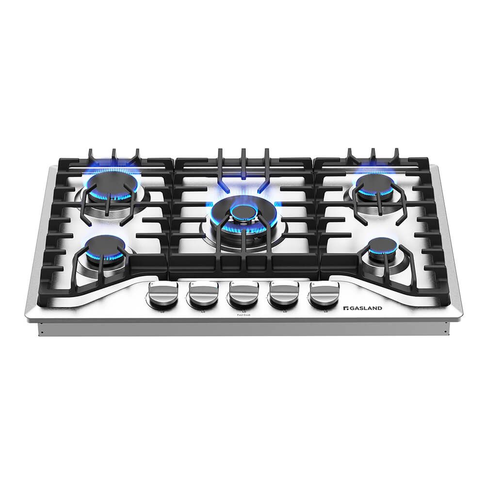 Gas cooktop with five burners on a white background